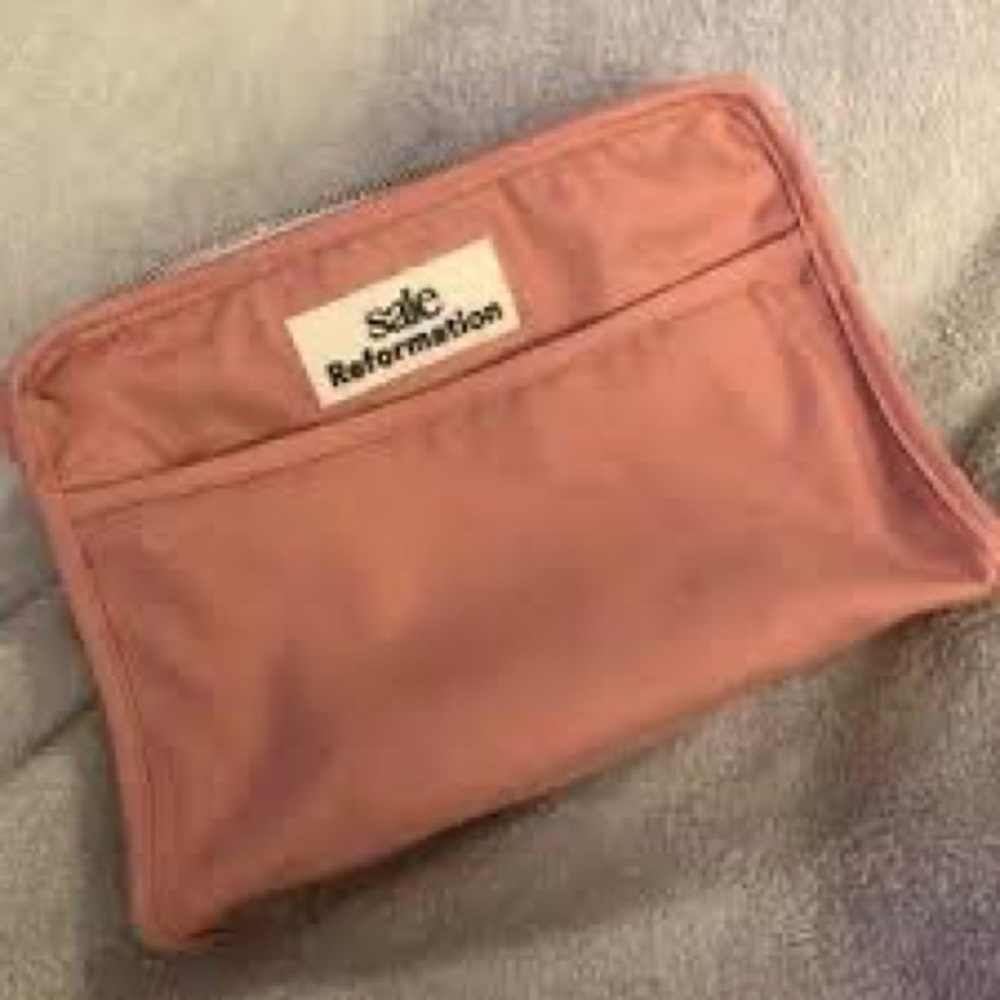 ISO THIS SAIE X REFORMATION TOILETRY POUCH